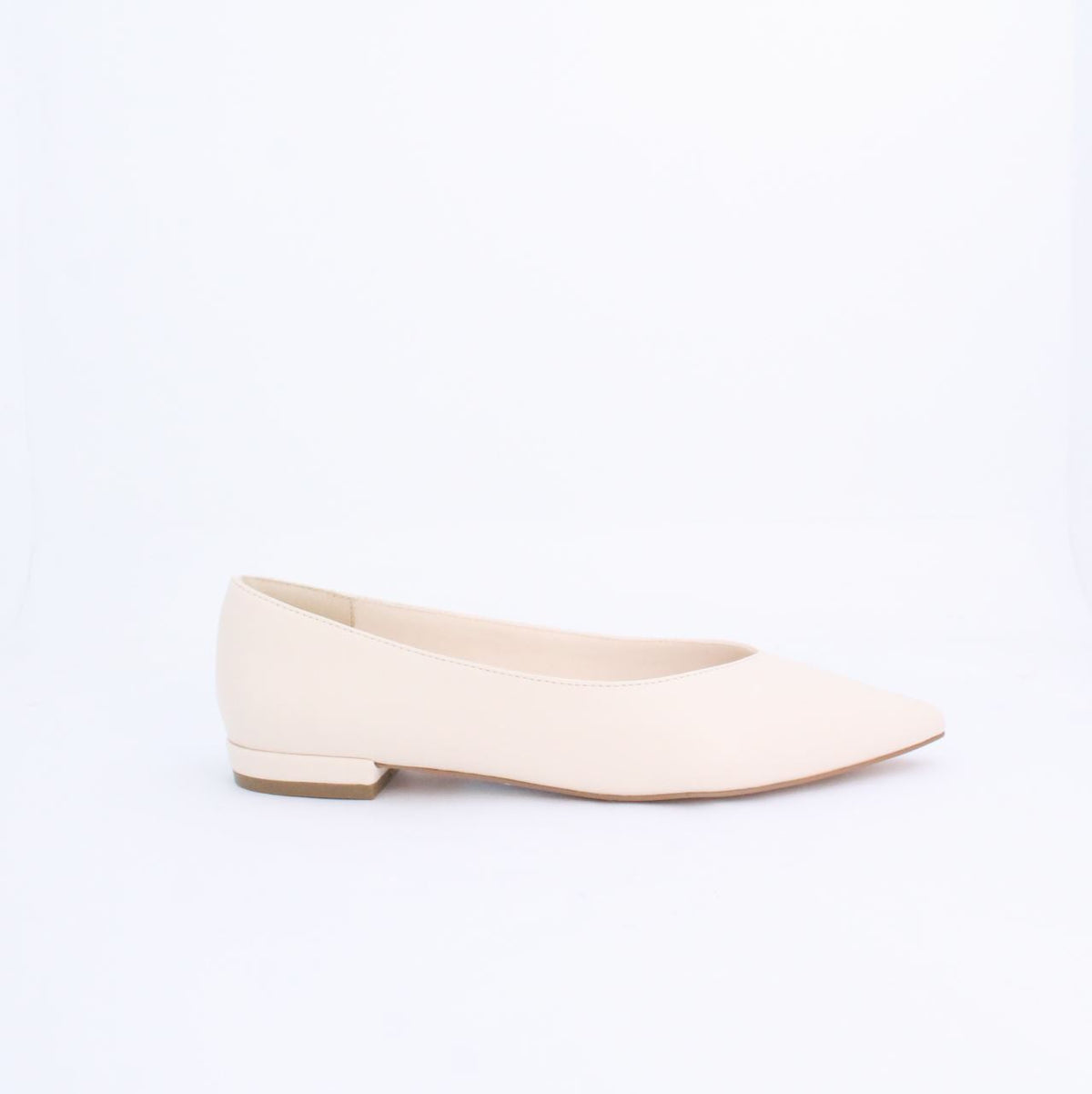 Cream Kiril pump flat shoe, minimalist design, faux leather, under 2cm heel, versatile for casual and formal outfits.