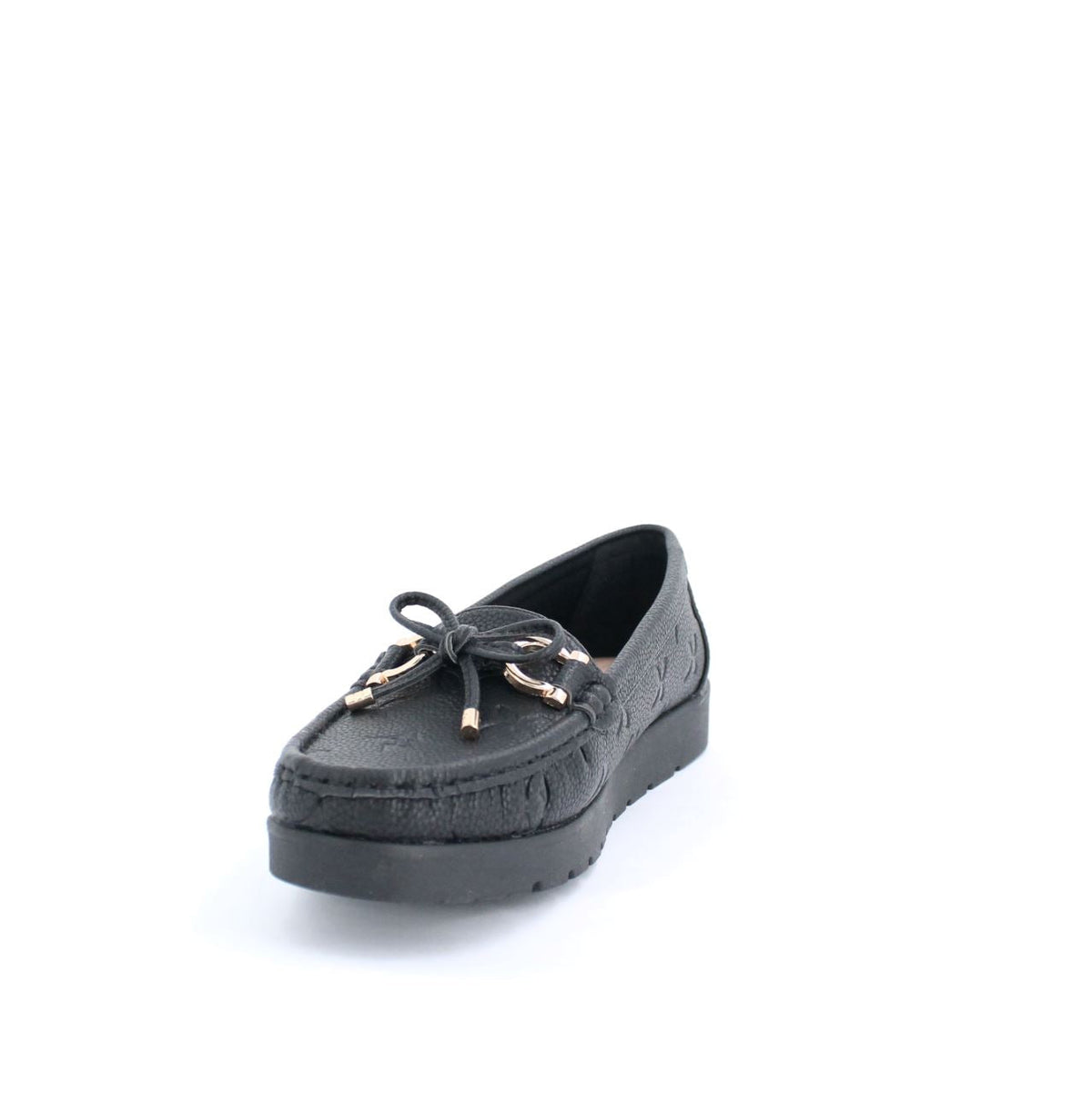 Black Adela moccasin with subtle embossed details and black rubber sole offering flexibility and traction for everyday wear.