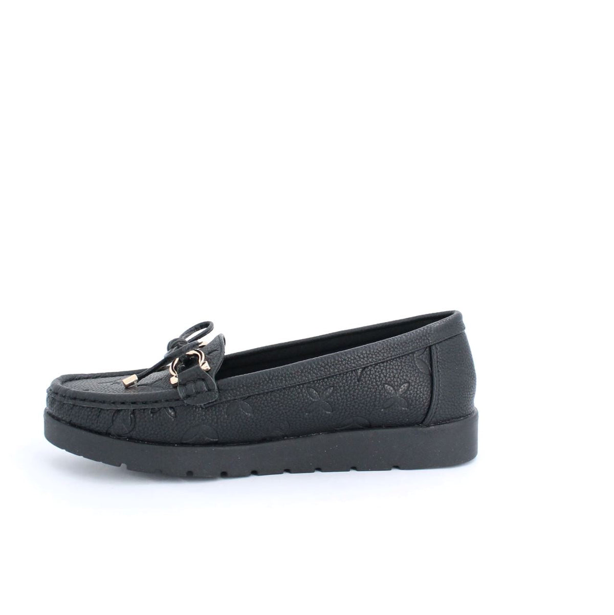 Black Adela moccasins with embossed details and rubber sole, perfect for versatile everyday wear.