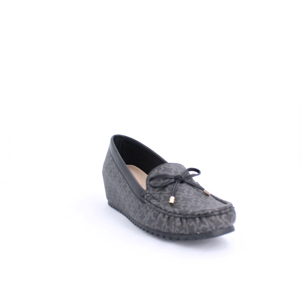 Black wedge moccasin with subtle patterns, faux leather, 2cm-5cm heel, rubber outsole for comfort and grip, suitable for versatile occasions.